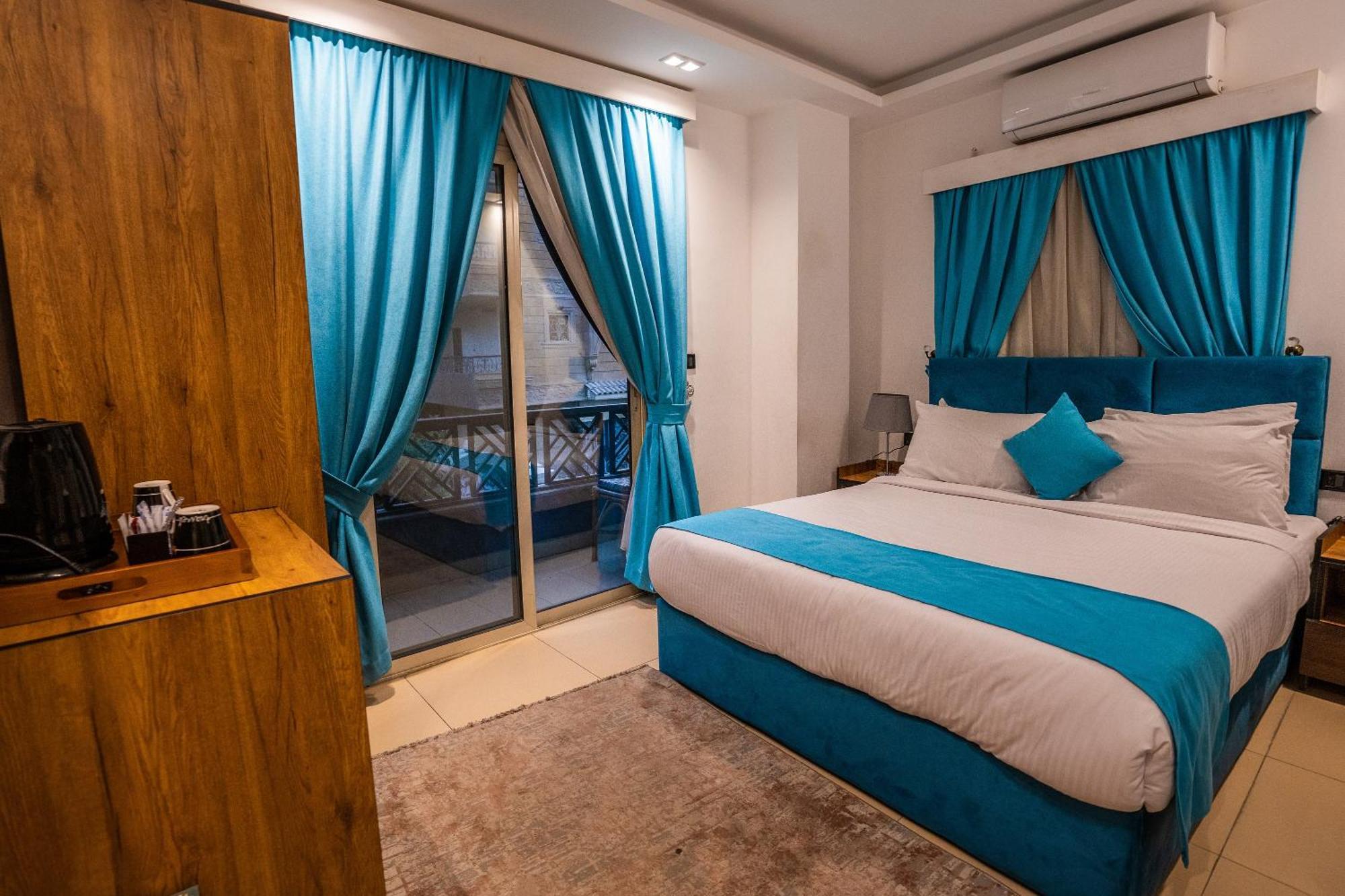 Pyramids Gem Plaza Hotel Kafret el-Gabal Eksteriør billede